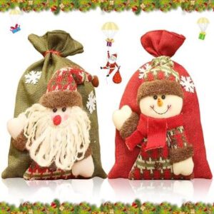 zwei weihnachtliche Geschenksäckchen mit Schneemann und Weihnachtsmannmotiv