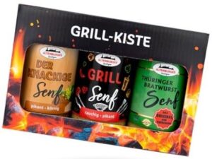 Karton mit Flammenmotiv und Aufdruck : Grill-Kiste, enthält drei verschiedene Senfsorten – Geschenkidee für Männer, die gerne grillen.